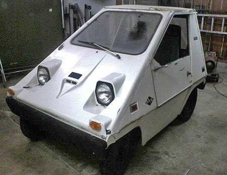 Citicar with original body shell, dinged up.